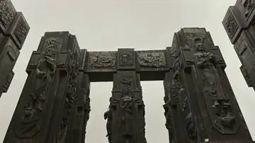 Thumbnail of Chronicle of Georgia monument pillars overlooking Tbilisi